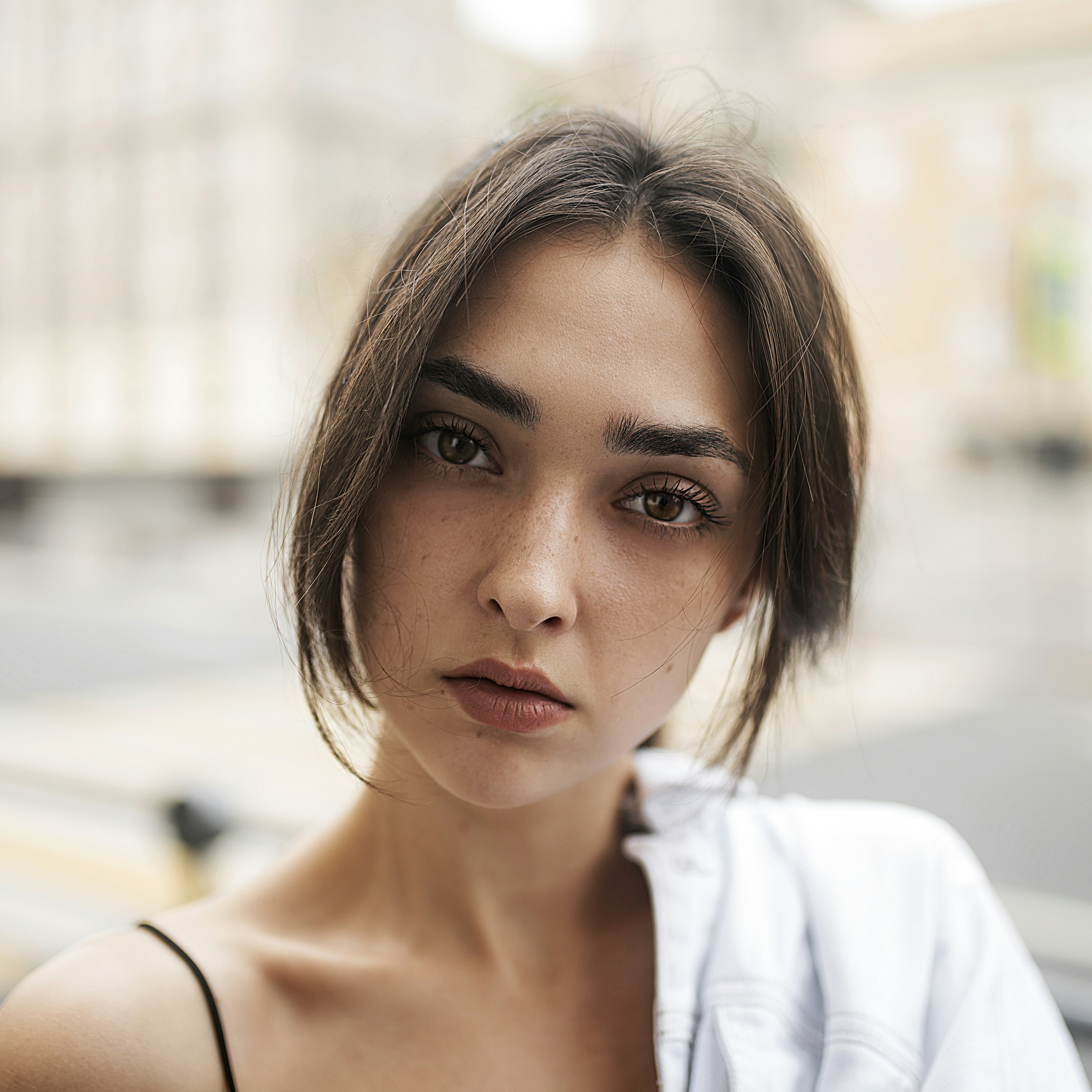 woman in white shirt smiling