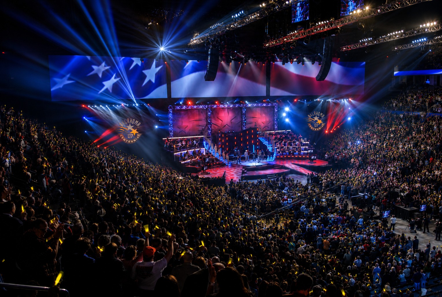 Stage production with lights and stadium crowd of the Oklahoma Centennial