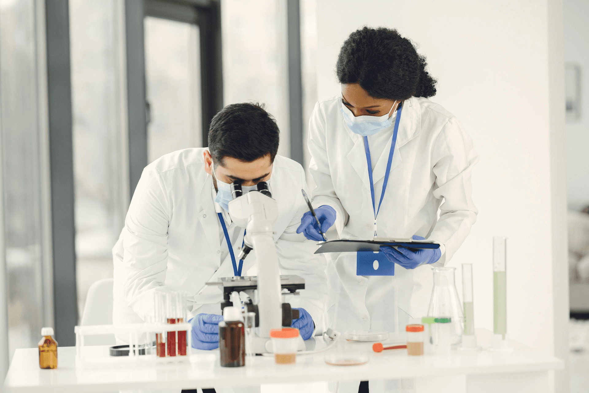 High school student conducting a case study research method with notes and data analysis on a desk
