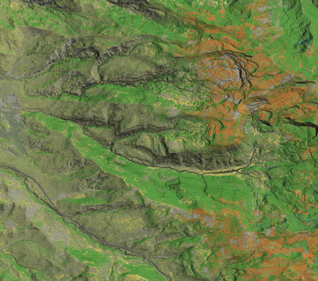 Topographic map showcasing a lush green landscape with varying shades indicating elevation changes, interspersed with brown and orange areas representing rocky or dry terrain.