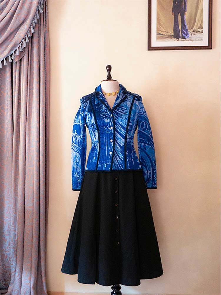 Vintage Gattinoni blue quilted jacket featuring contrast piping and structured tailoring, sourced from global designer archives.