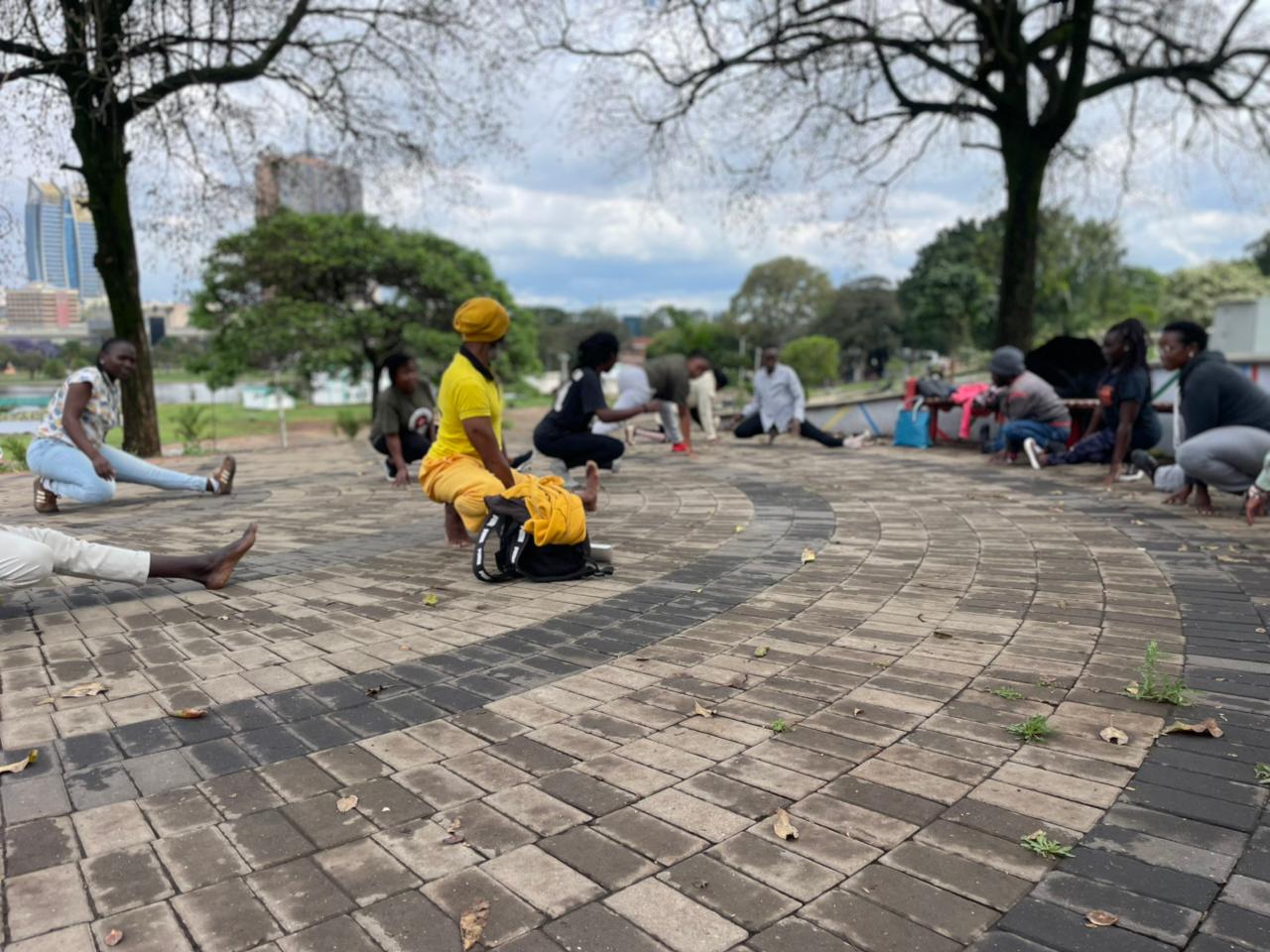 a couple of people standing next to a motorcycle