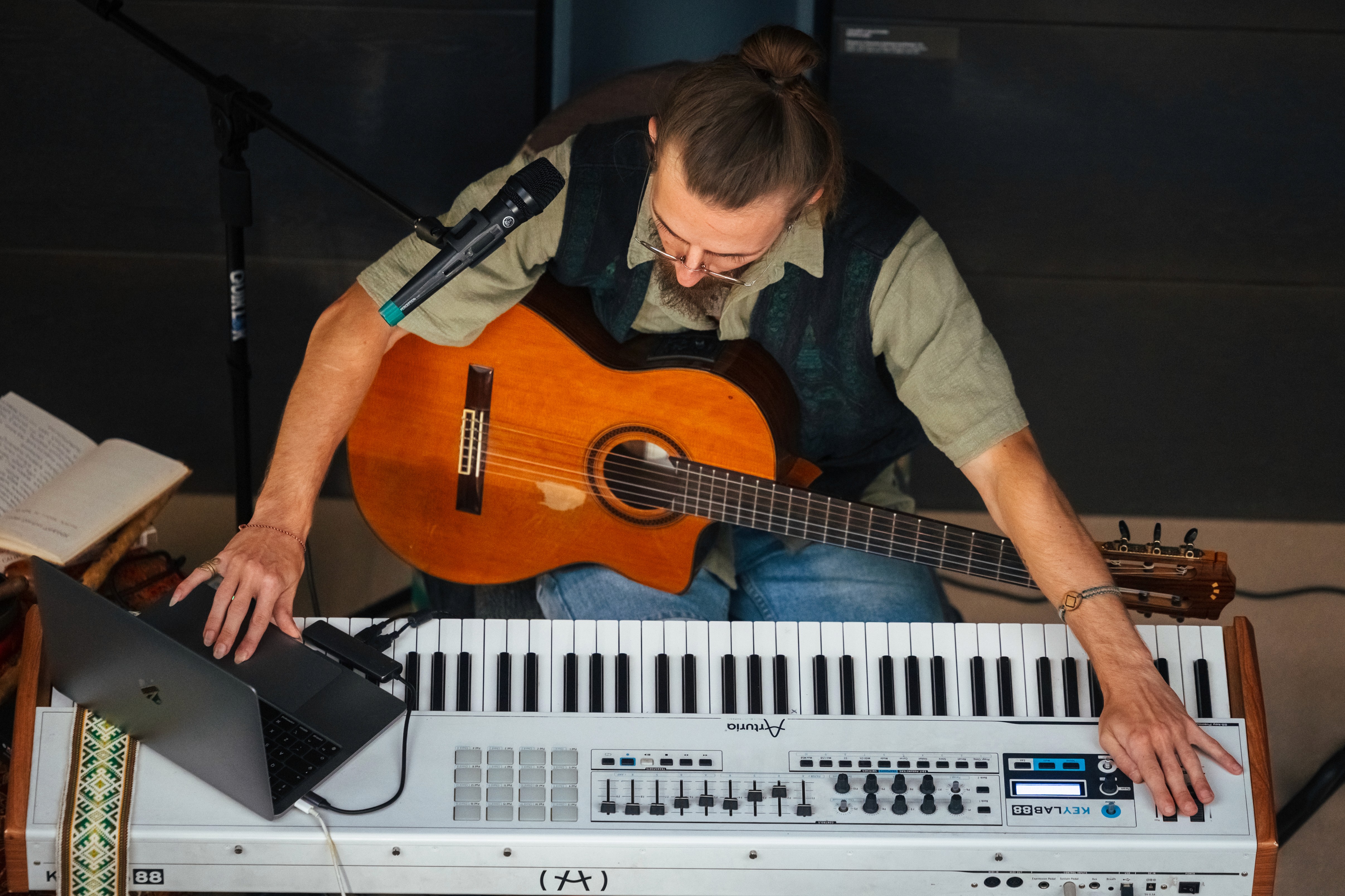 a blurry photo of a person standing in front of a wall