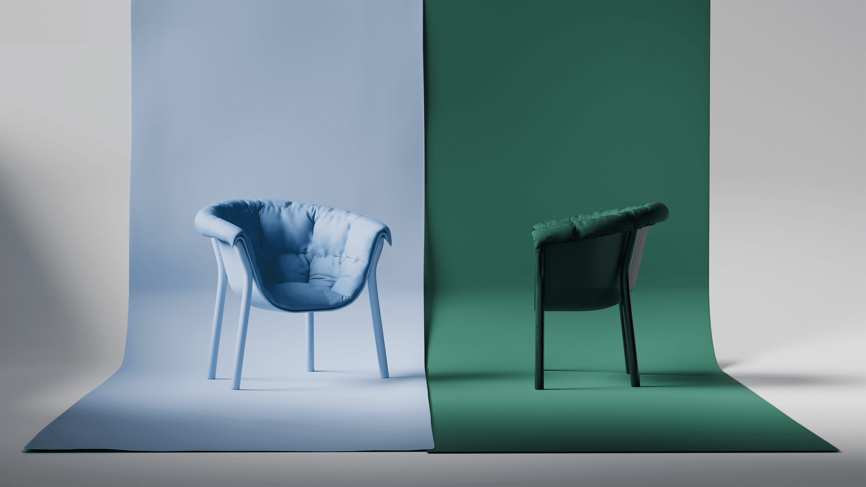 Image of two chairs, burgubdy blue and green in a studio.