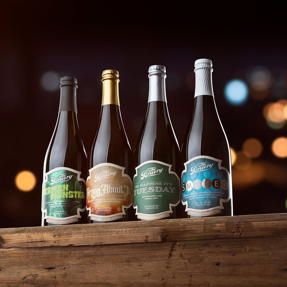 The Bruery mixed bottle lineup on wooden table