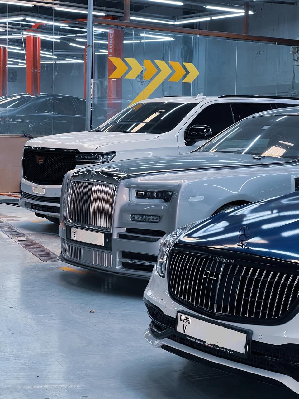 Cadillac, Rolls Royce and Mercedez Benz Parked at Advanz Tech