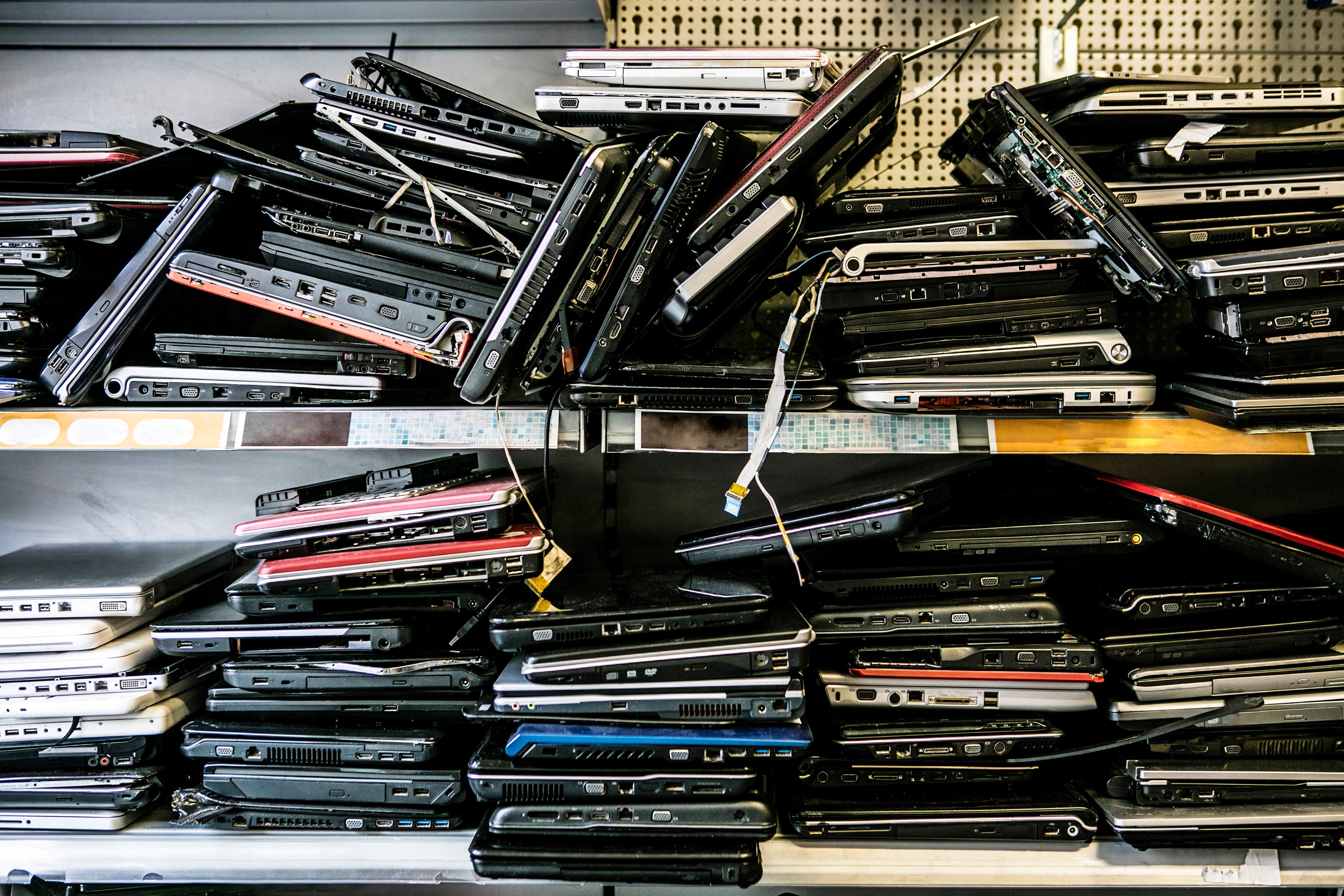 stacks of old laptops