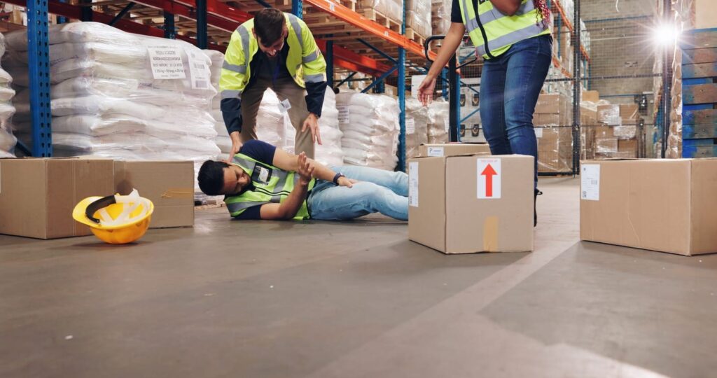 fail-fall-and-boxes-with-man-in-warehouse