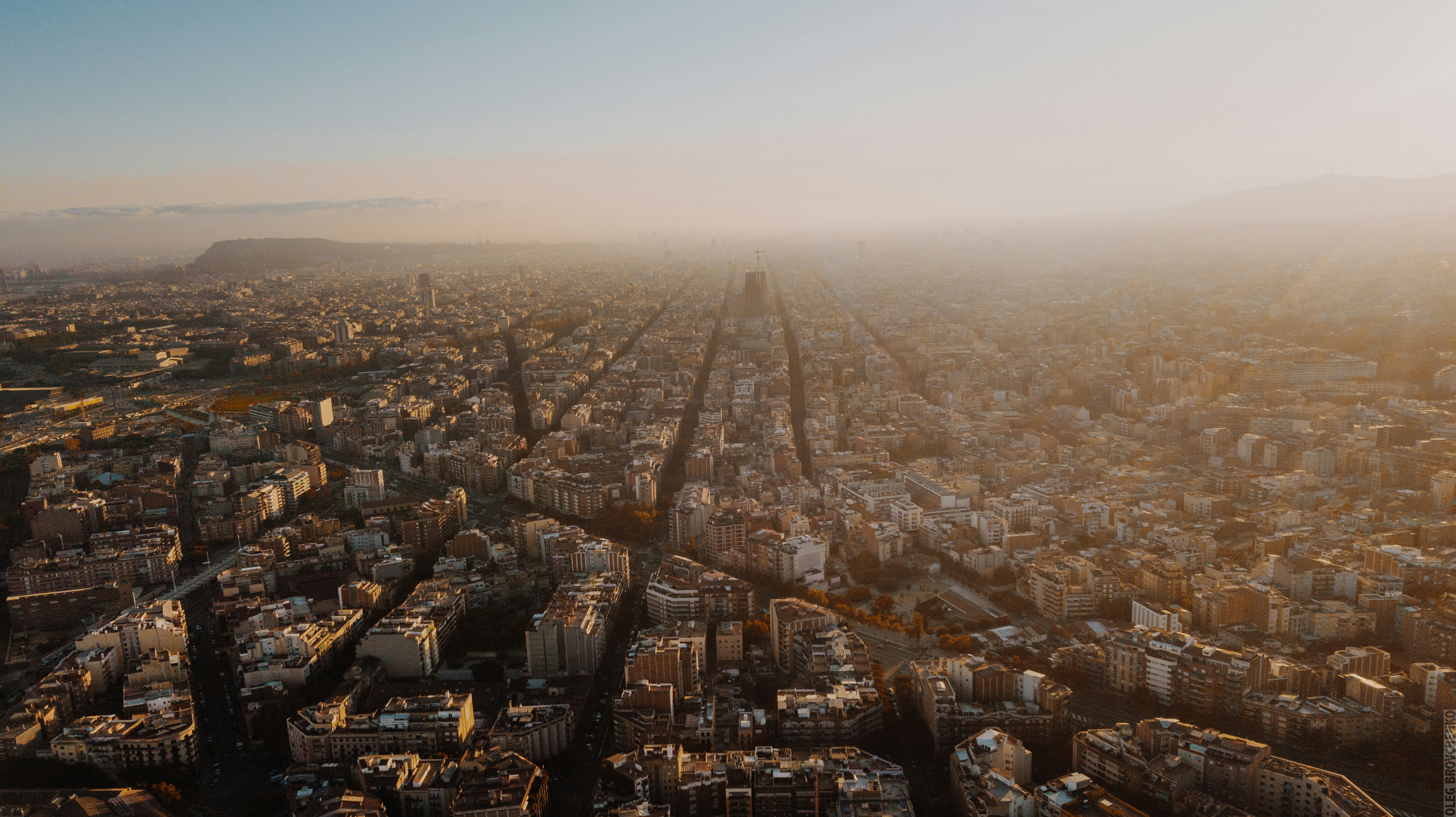 an aerial view of a city with tall buildings