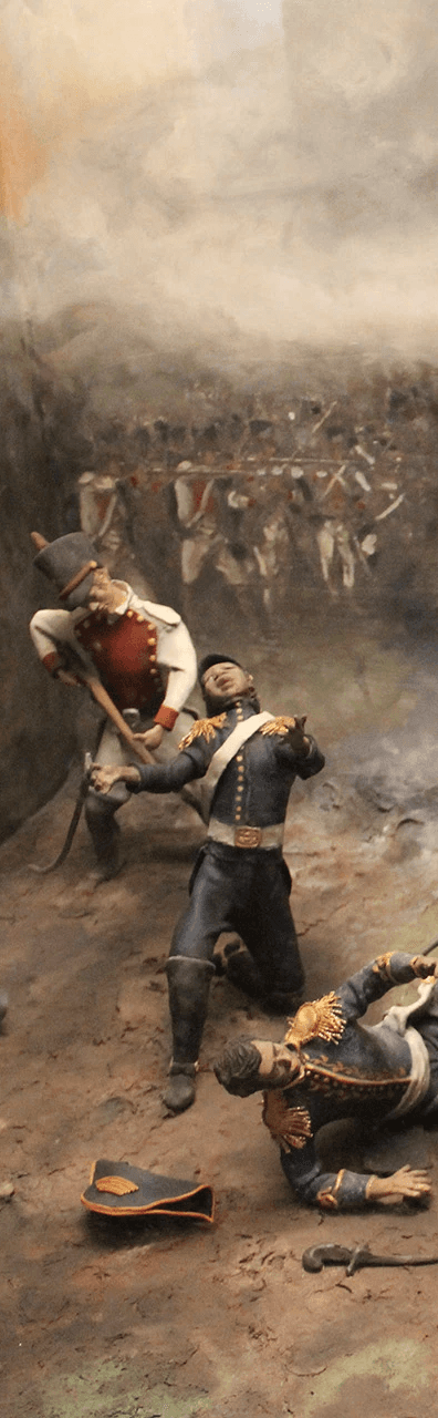 Portrait of a person in dark clothing speaking on a phone