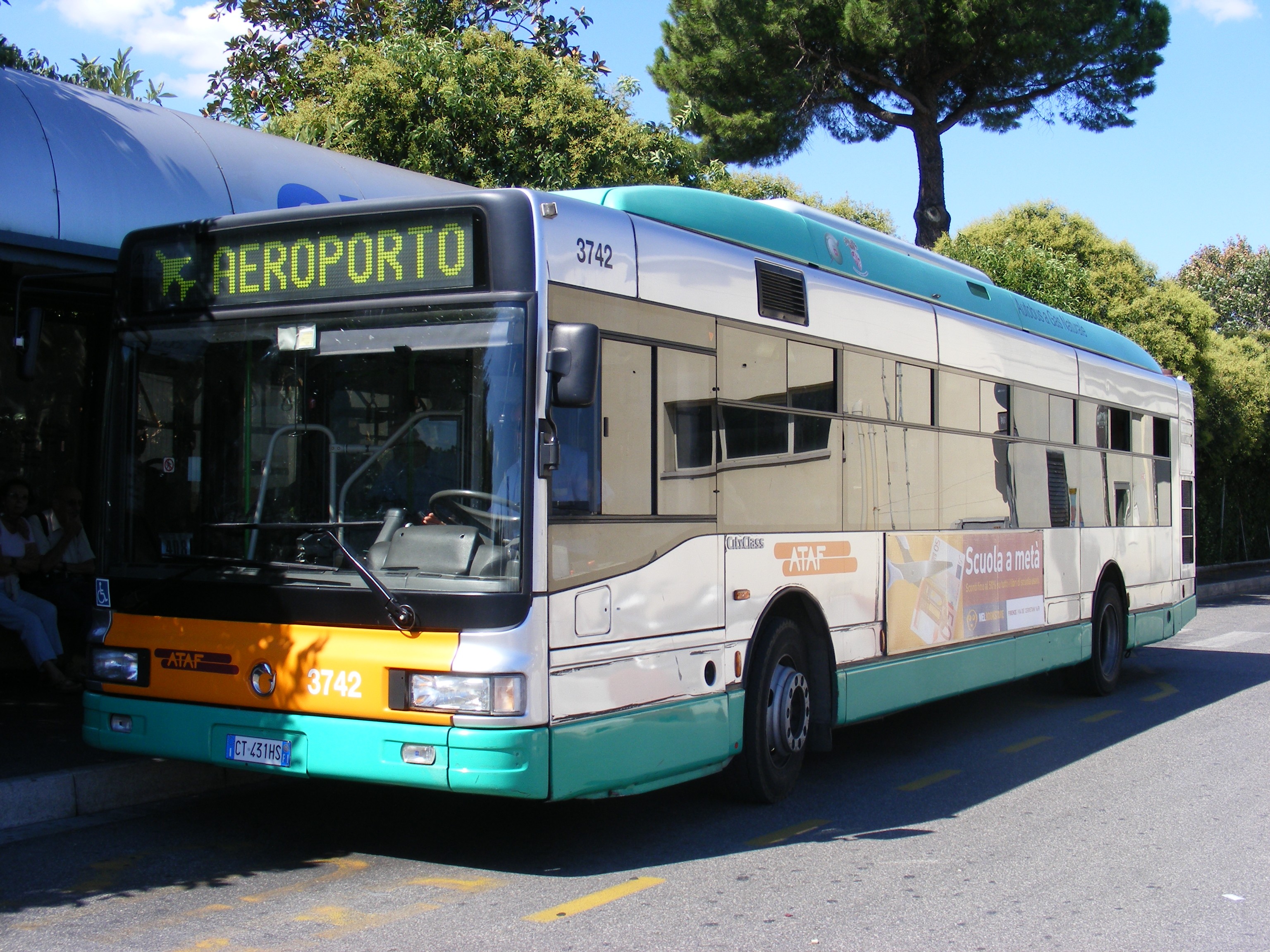 a bus is parked in front of a building