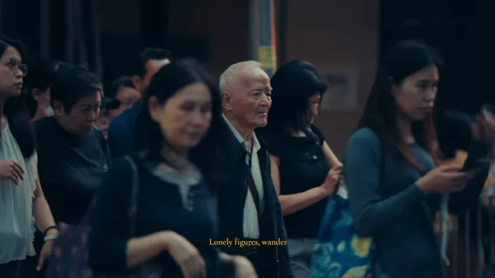 Multiple Chinese people walking across the street