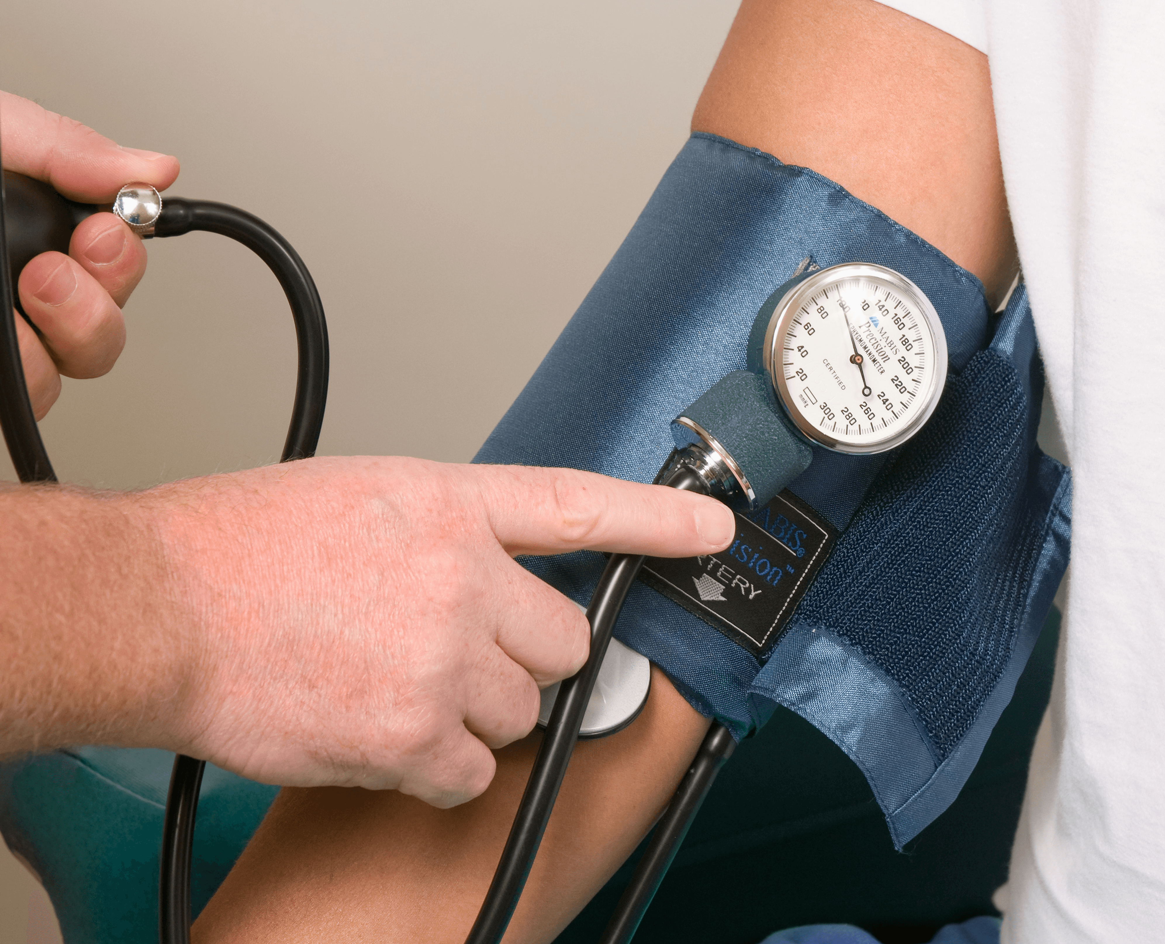 a doctor checking the blood pressure of a patient