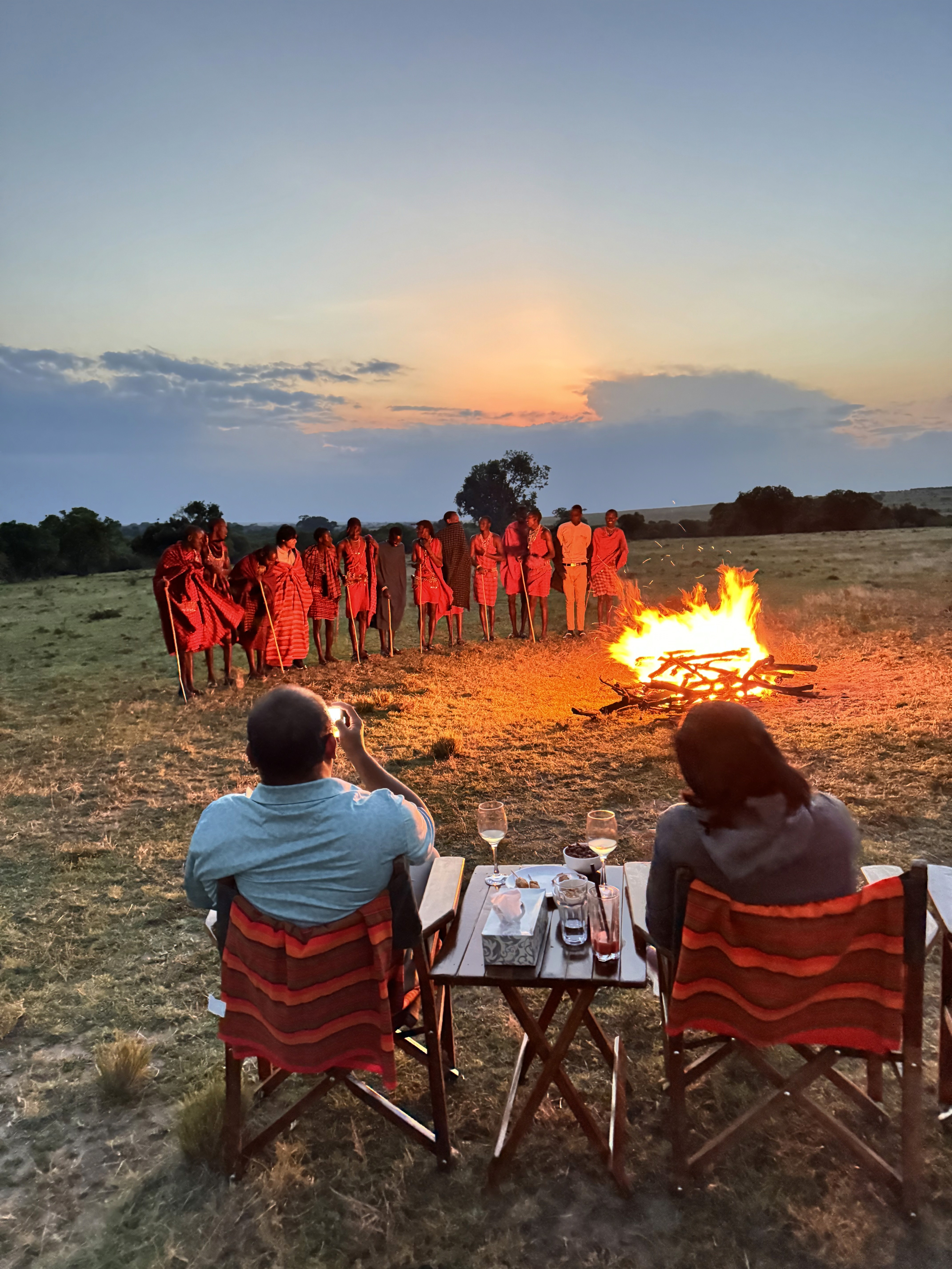 By the bush for the sundowner, enjoying a Maasai dance