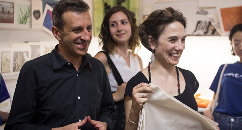 man and woman laughing