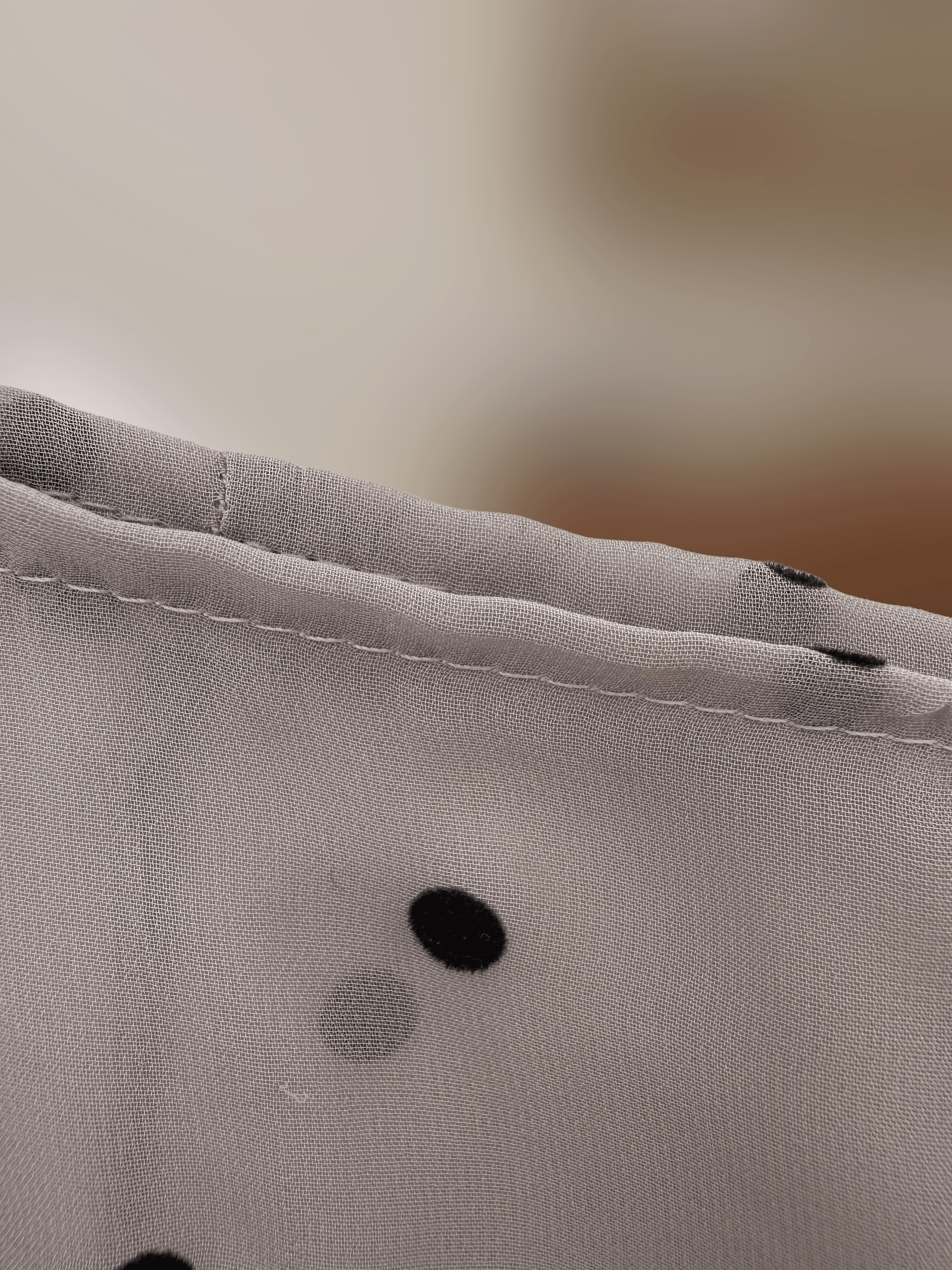 close up of seam on polka dot skirt