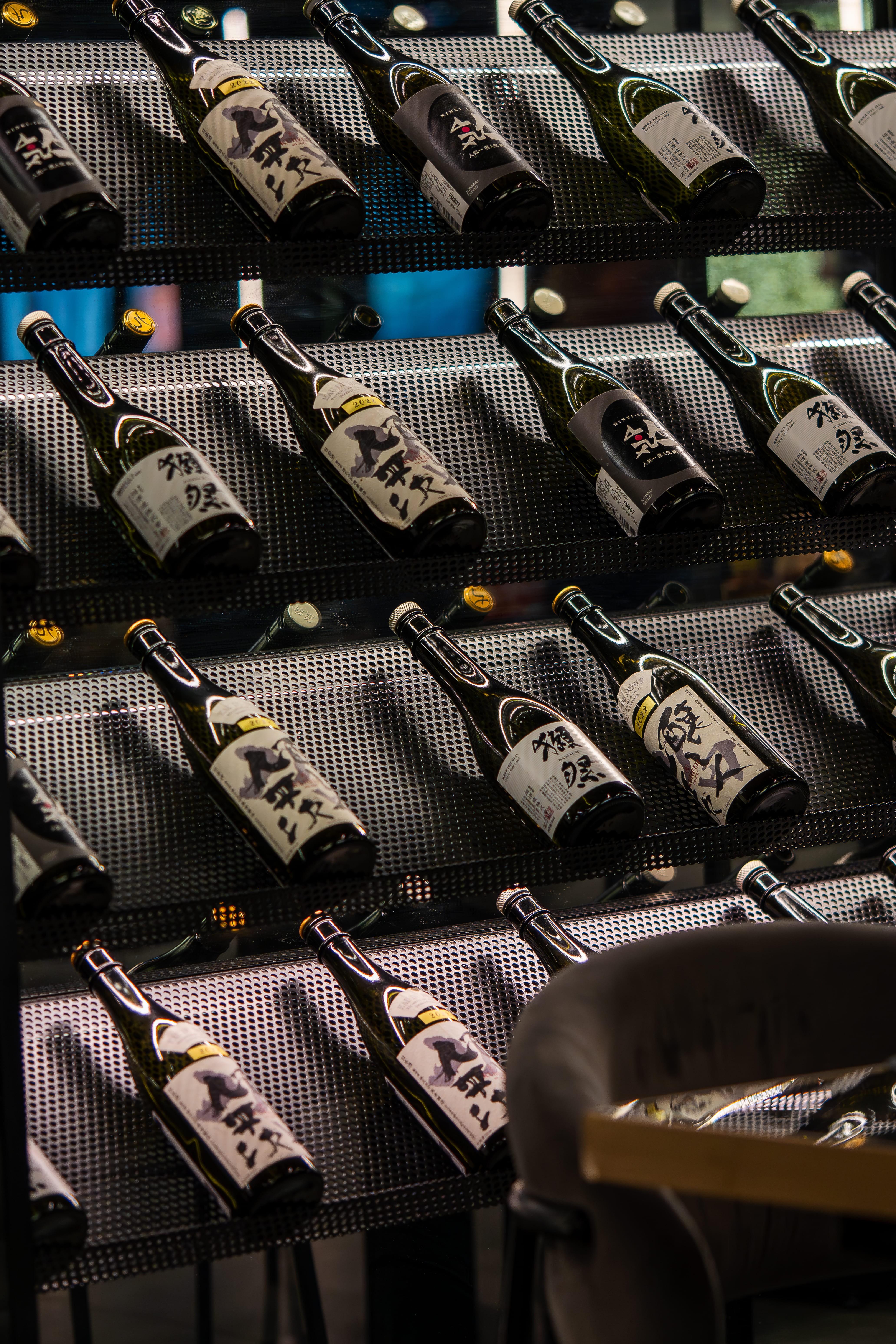 Chef in a bustling kitchen, skillfully plating a dish under warm lighting. Copper pots steam in the background, creating a focused, dynamic atmosphere.