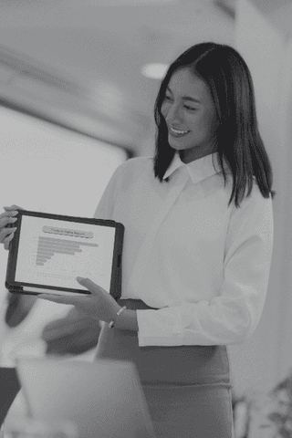 three men sitting on chair beside tables