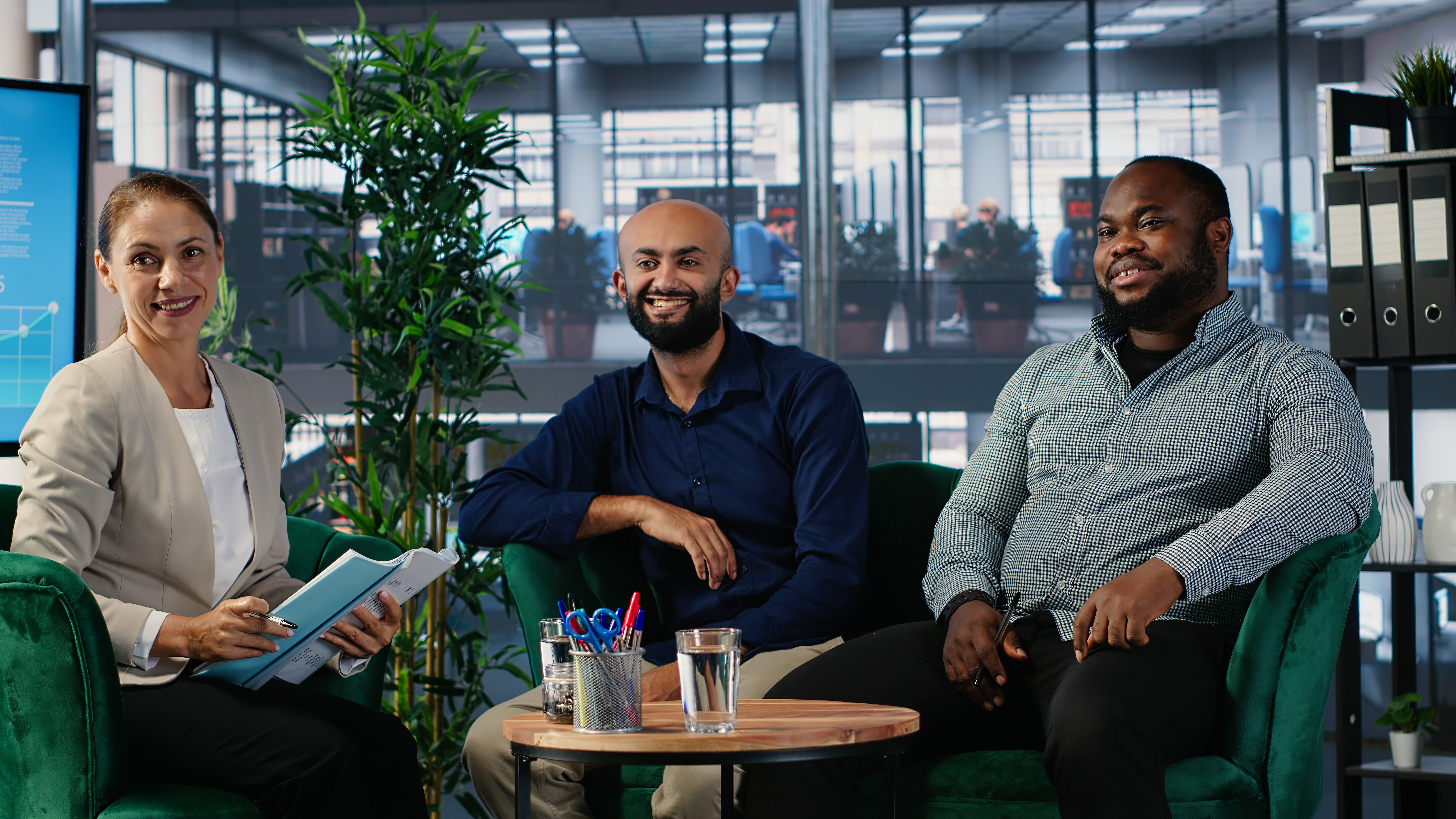 people sitting on chair in front of laptop computers