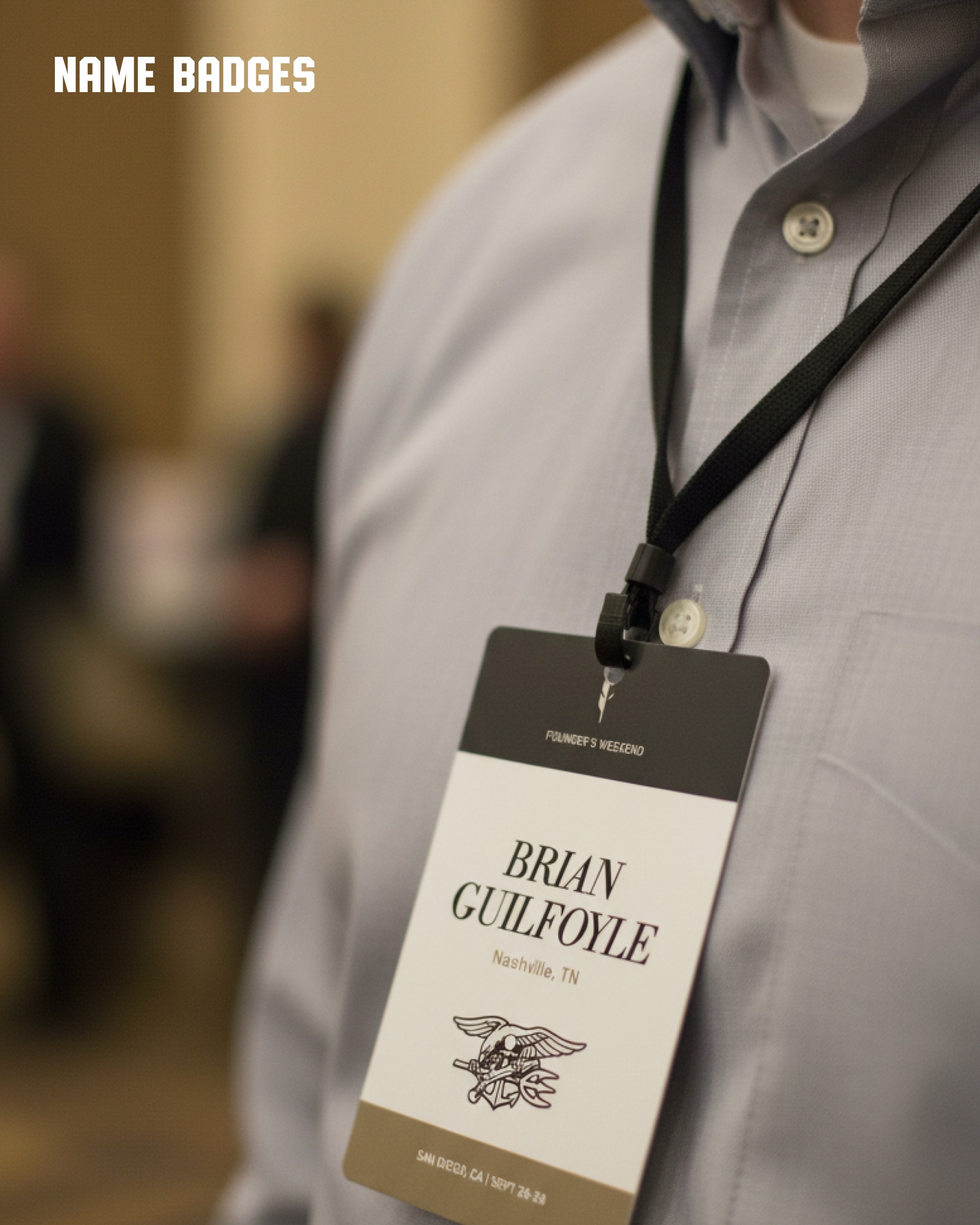 Man with lanyard name badge