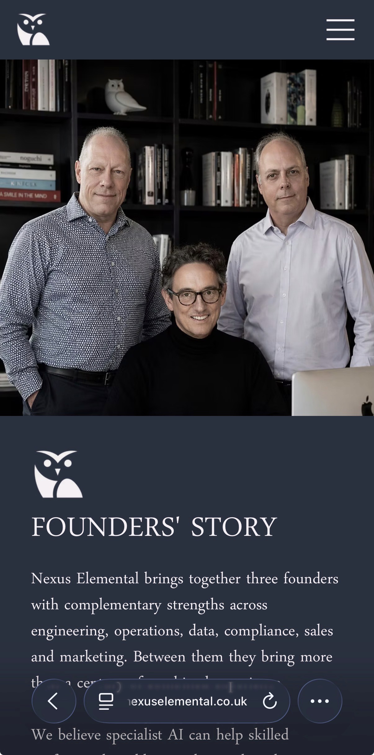 Minimalist living space featuring oak flooring, timber wall panels and panoramic windows with natural light.