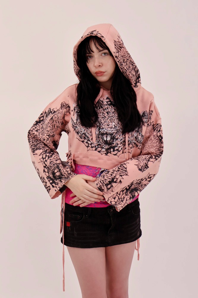 female model wearing pink jumper