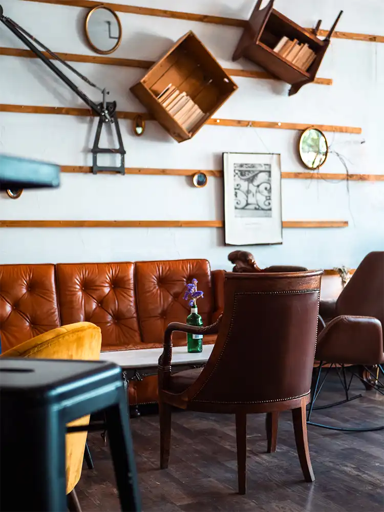 Portrait of a bartender pouring a cocktail