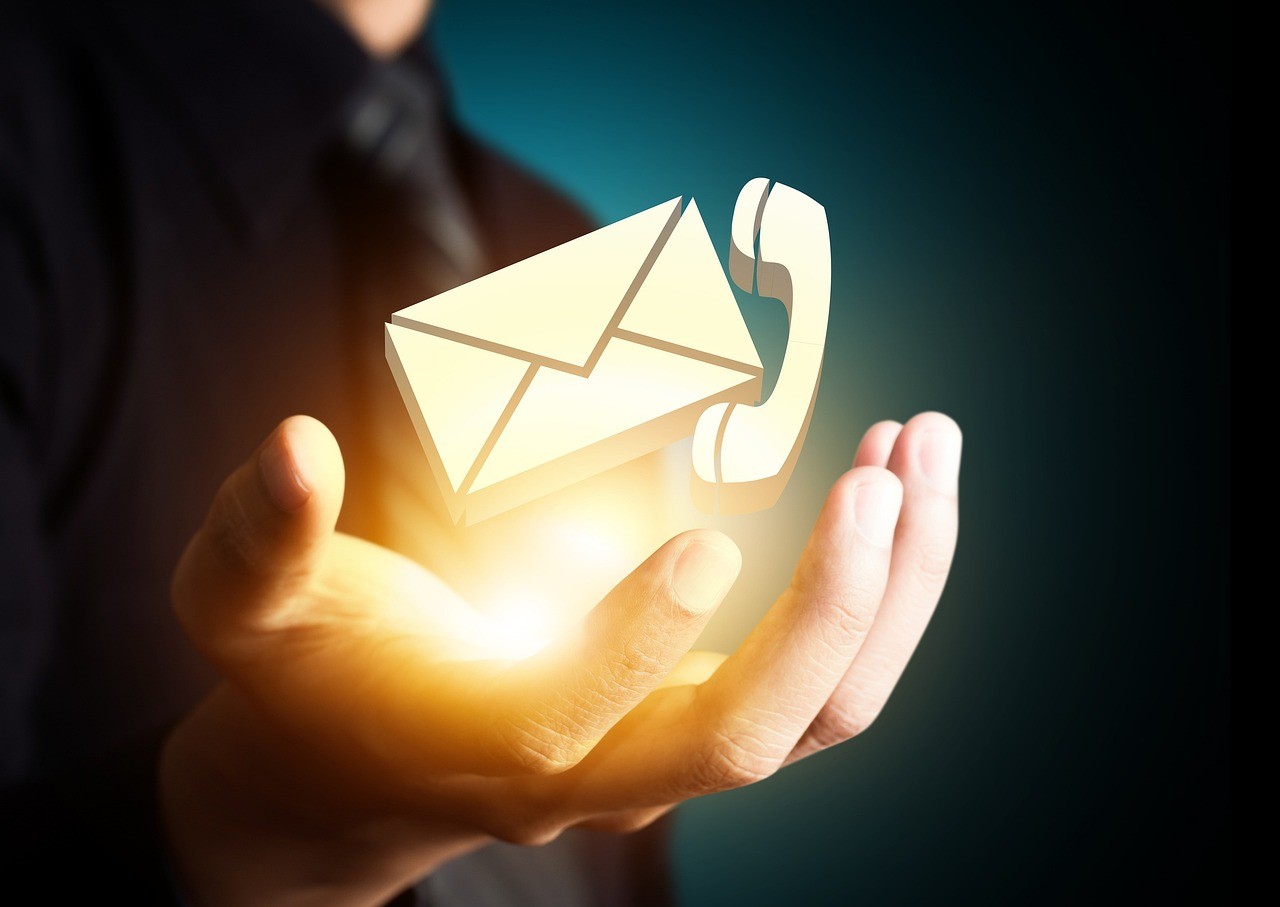 Contact icons representing email and phone communication