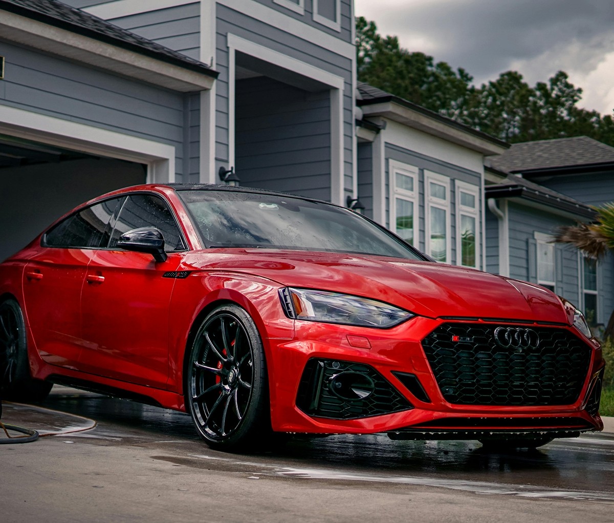 Red Audi being washed