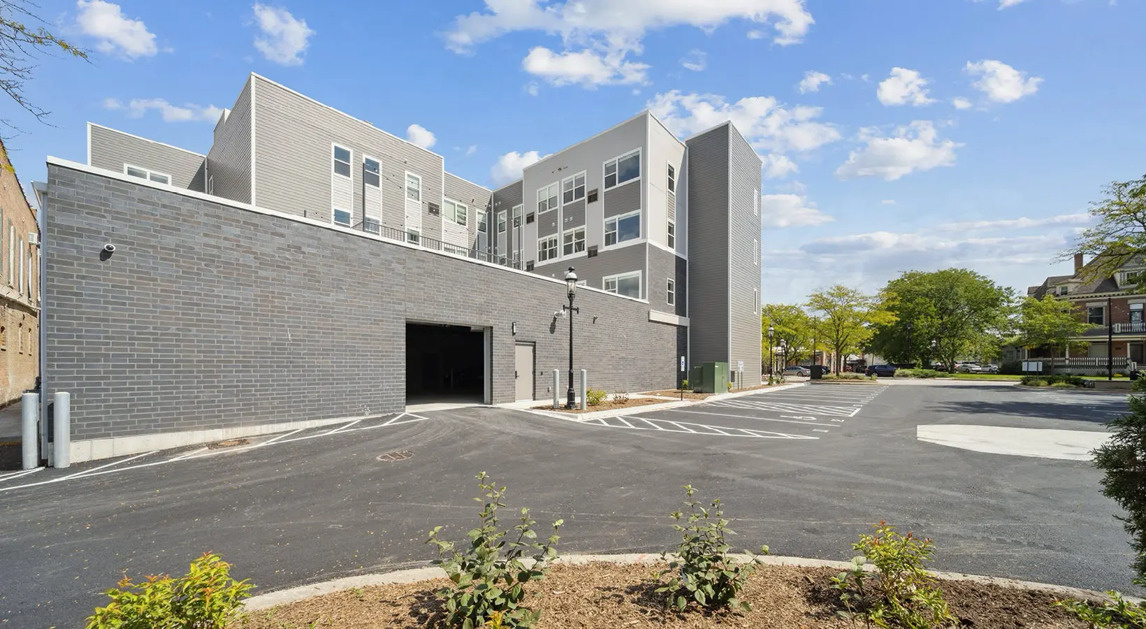 A view of the private parking area and garage available for residents at The Hartford Apartments in Homewood, Illinois.