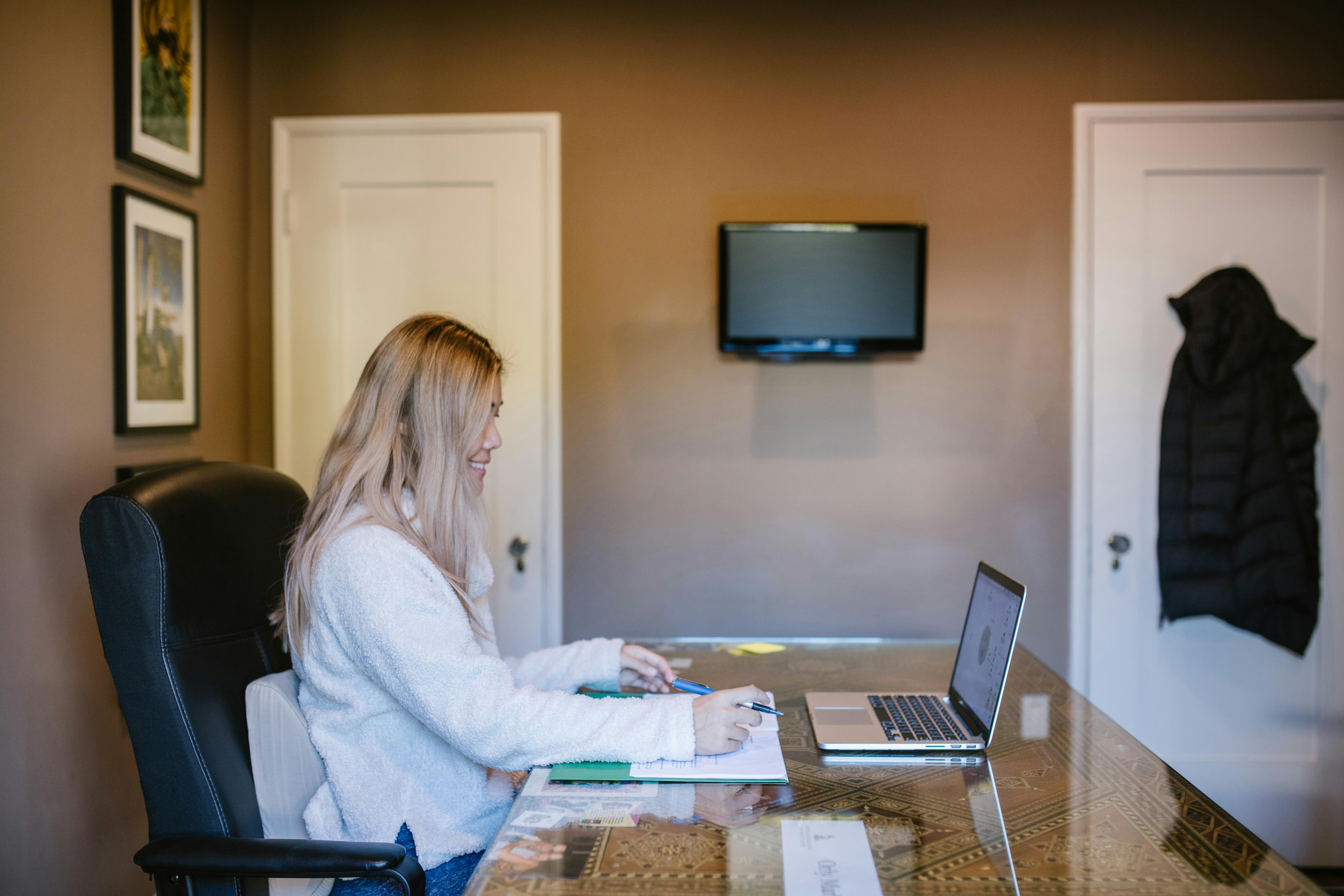 woman studying on laptop
