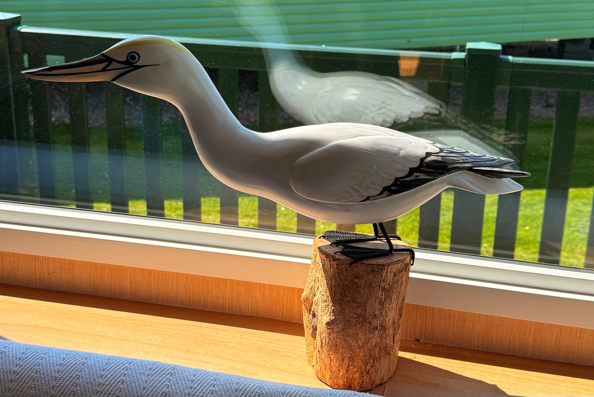 a closer look at our beeutiful bird ornament nesting on the window sill