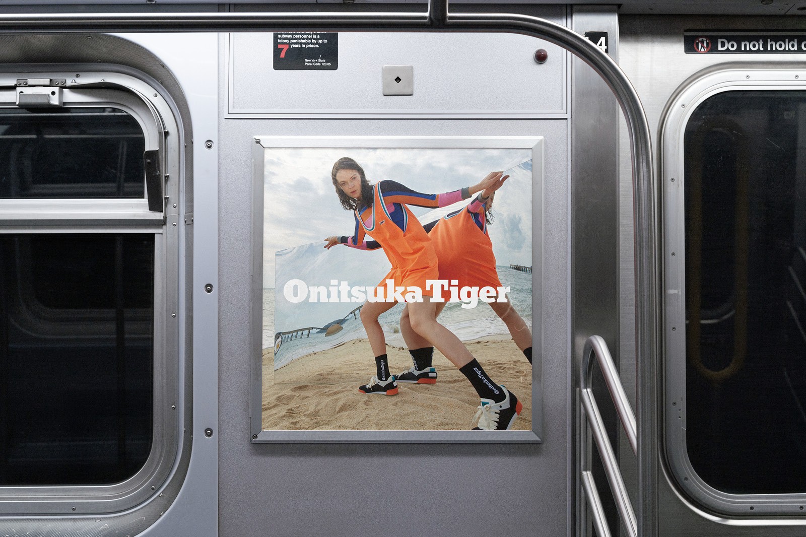 A colorful advertisement featuring a person in motion, displayed on the interior wall of a subway train.