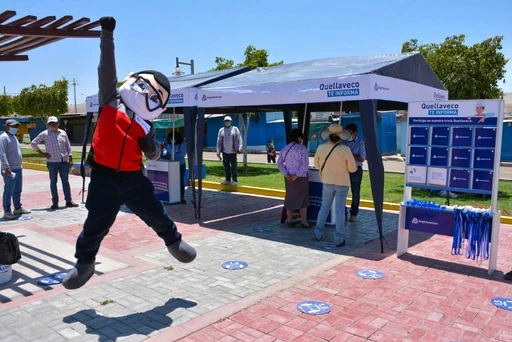 An arc with a view of the ocean and a cloud floating on top