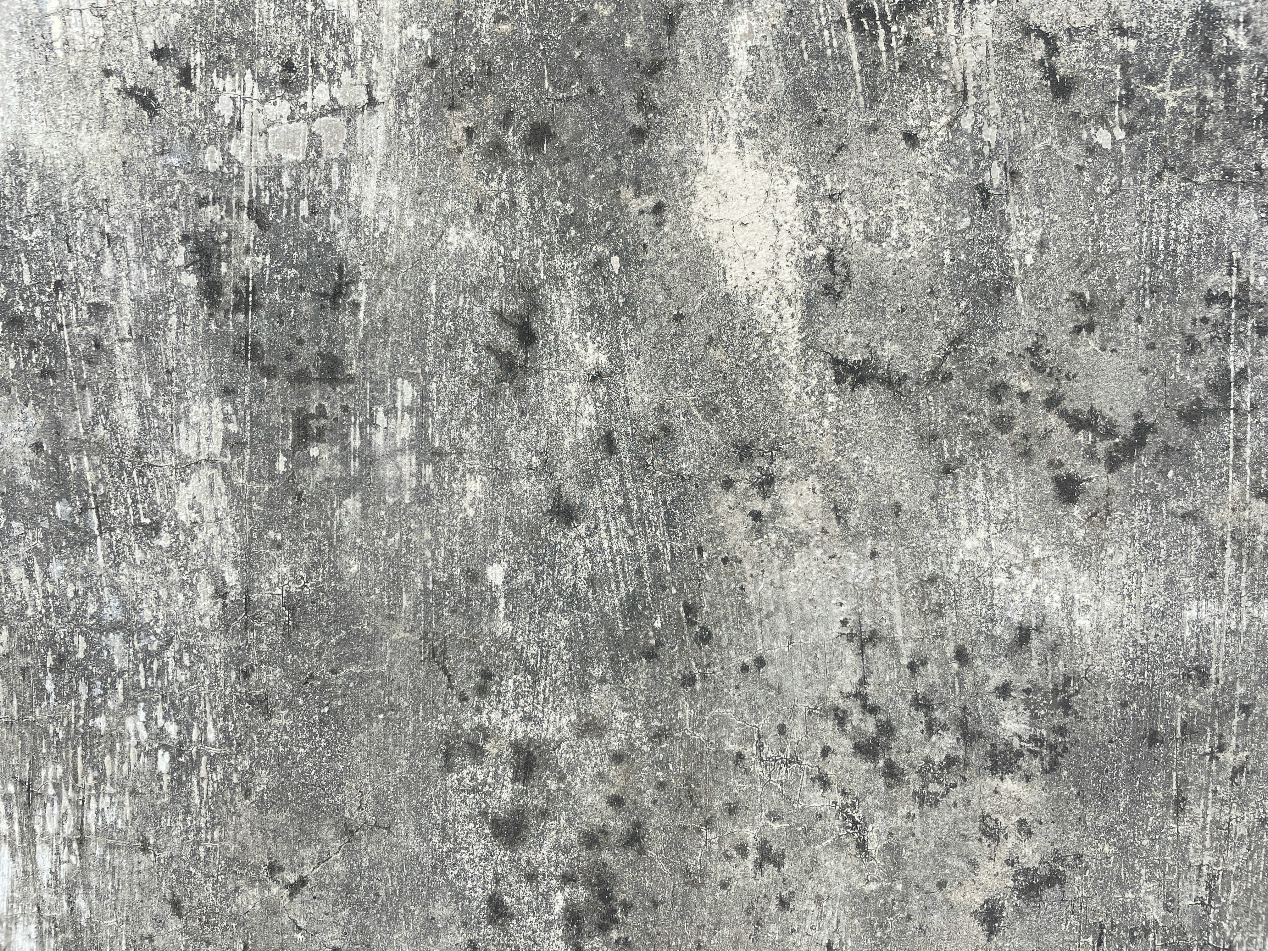 a grungy surface with speckles