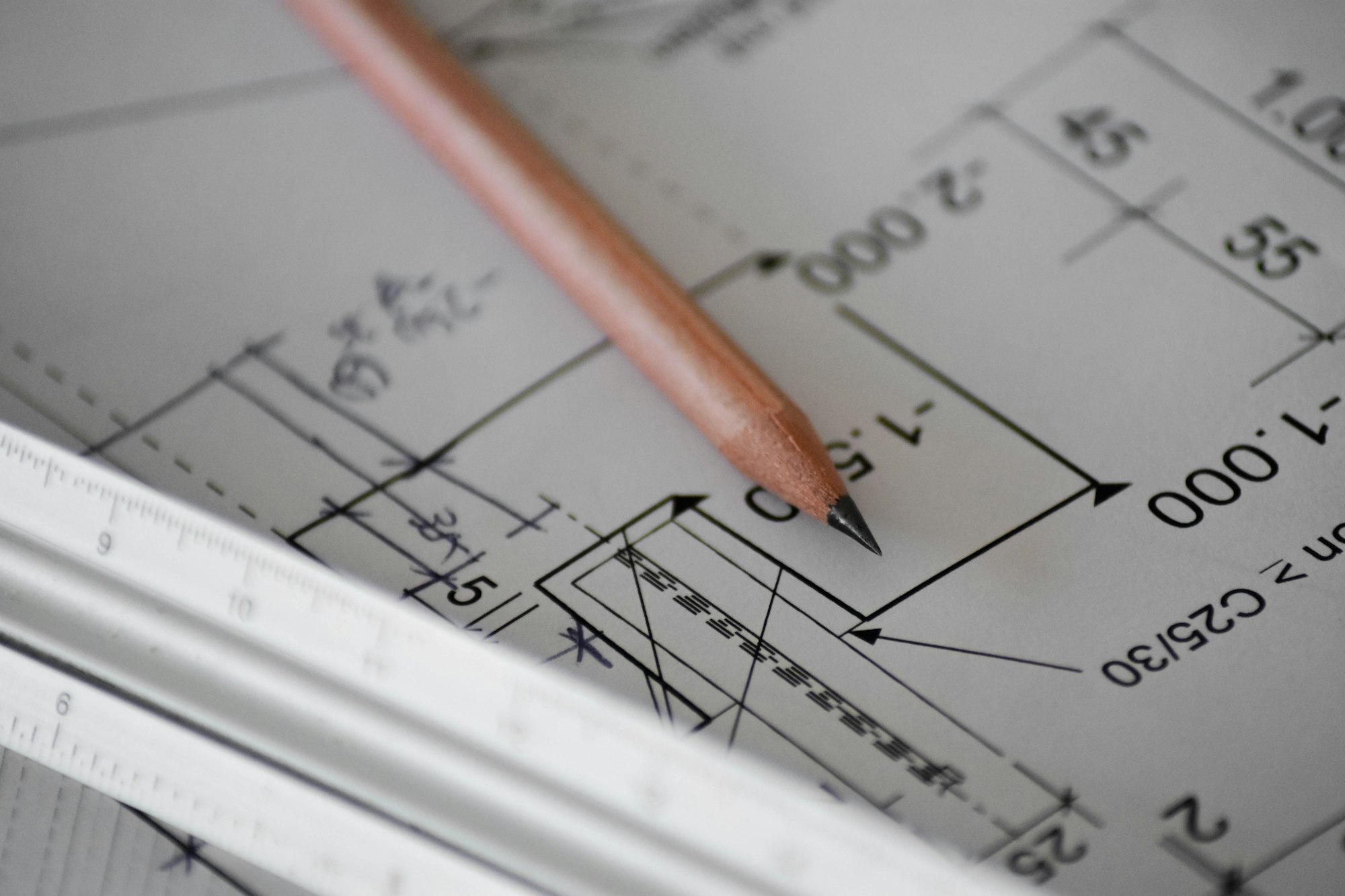 Pencil resting on a technical drawing