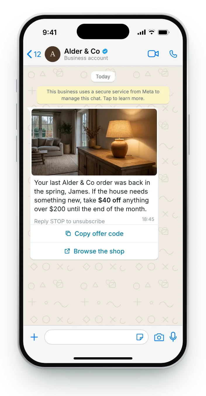 A comeback offer behind a copy-code button: WhatsApp win-back message on an iPhone