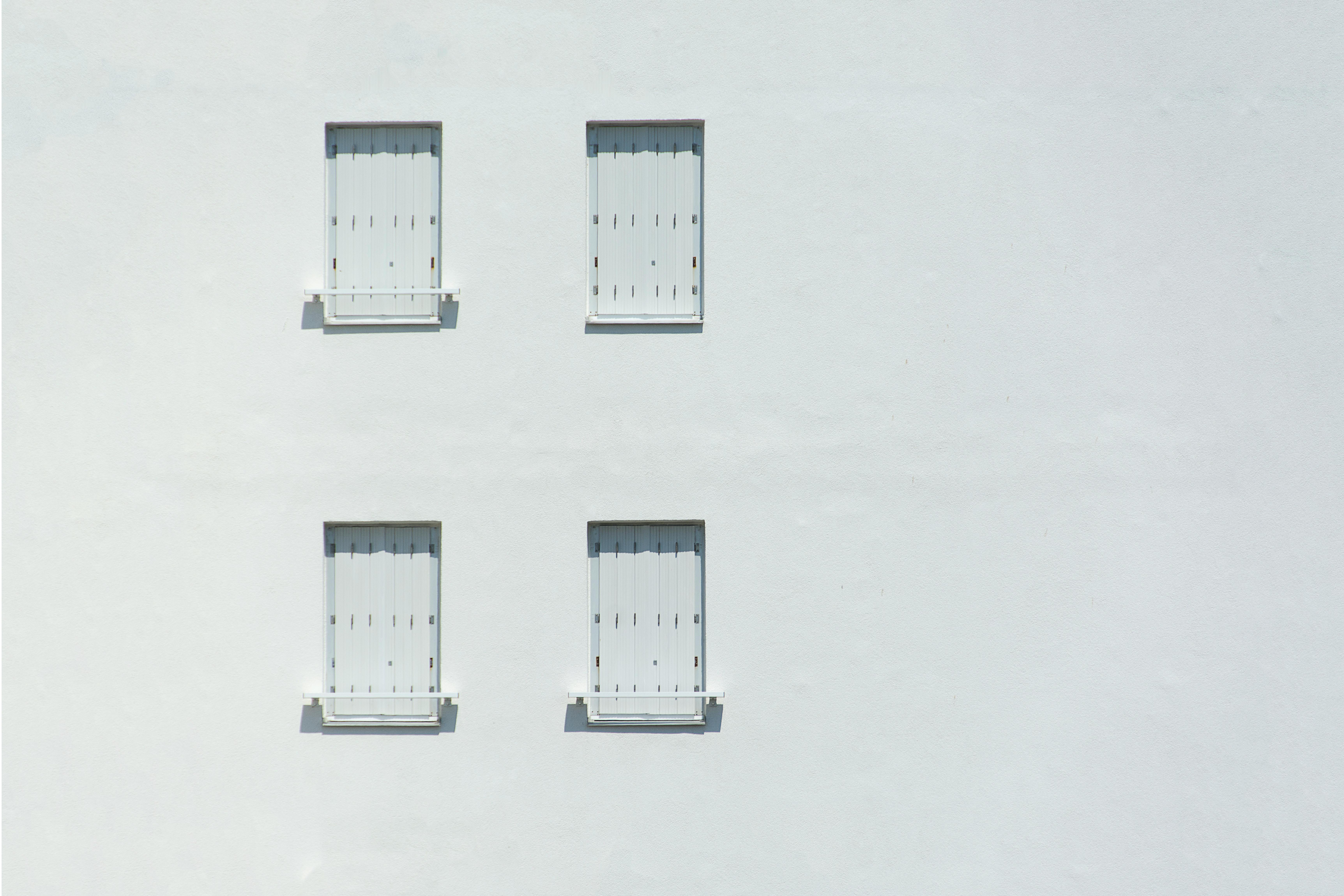 White Wall and Windows Shutters in Building
