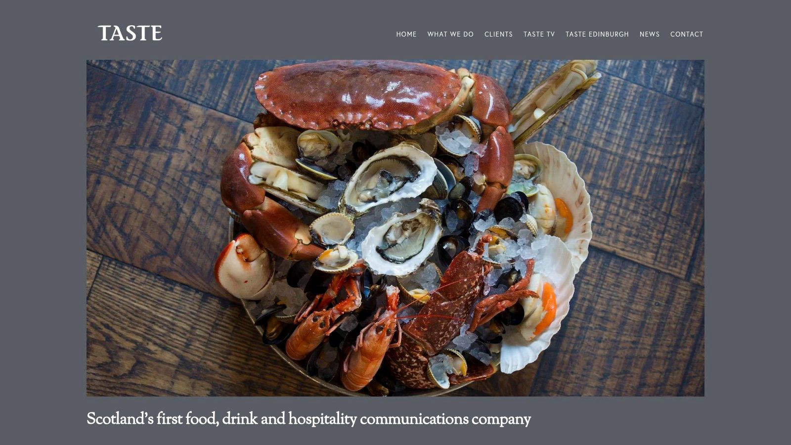 A beautifully arranged seafood platter with oysters, langoustines, and lemons, representing the high-end hospitality clients of Taste Communications.