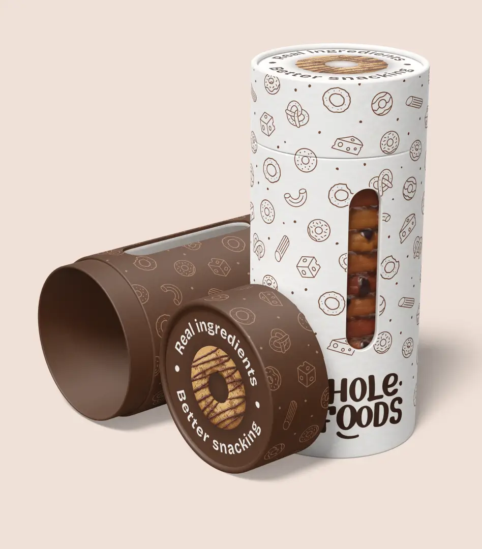 Round Hole Foods snack canister packaging, open to reveal a chocolate-drizzled donut-shaped snack inside, alongside its brown lid.