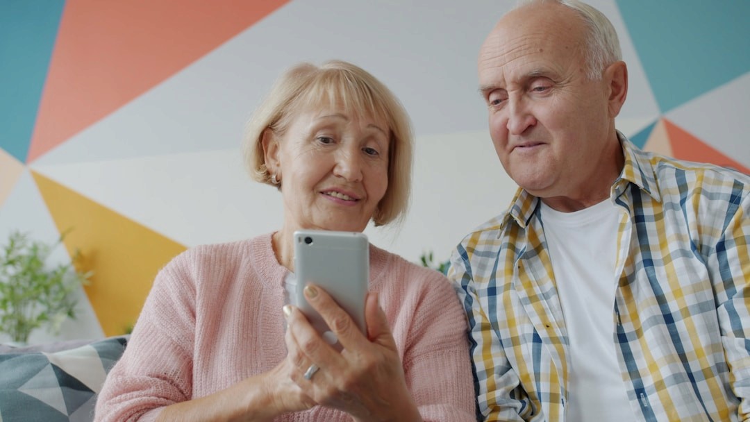 elderly person with family member video call