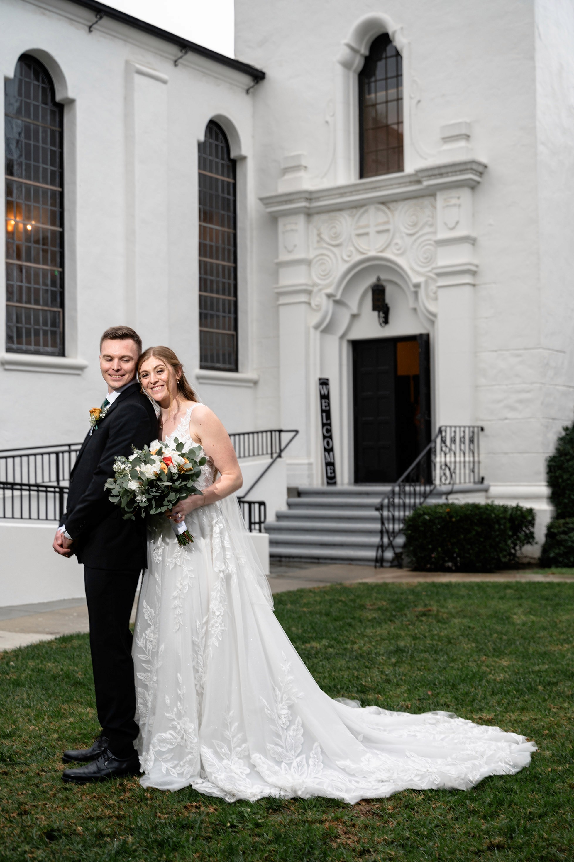 Flat lay wedding details with bouquet, rings, and sparkling bridal heels