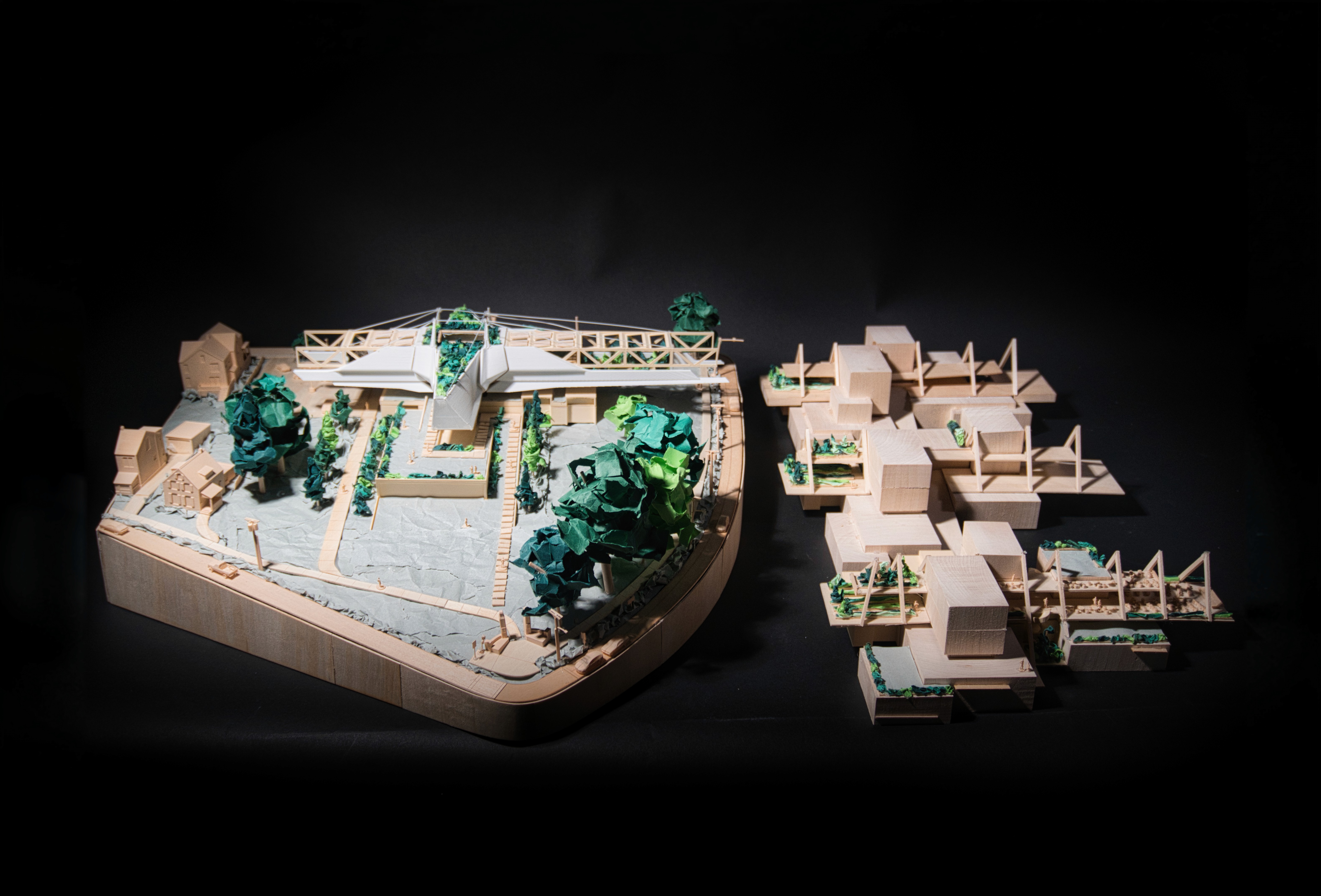 1/16" Model iterations showing the final massing alongside three other massing options.