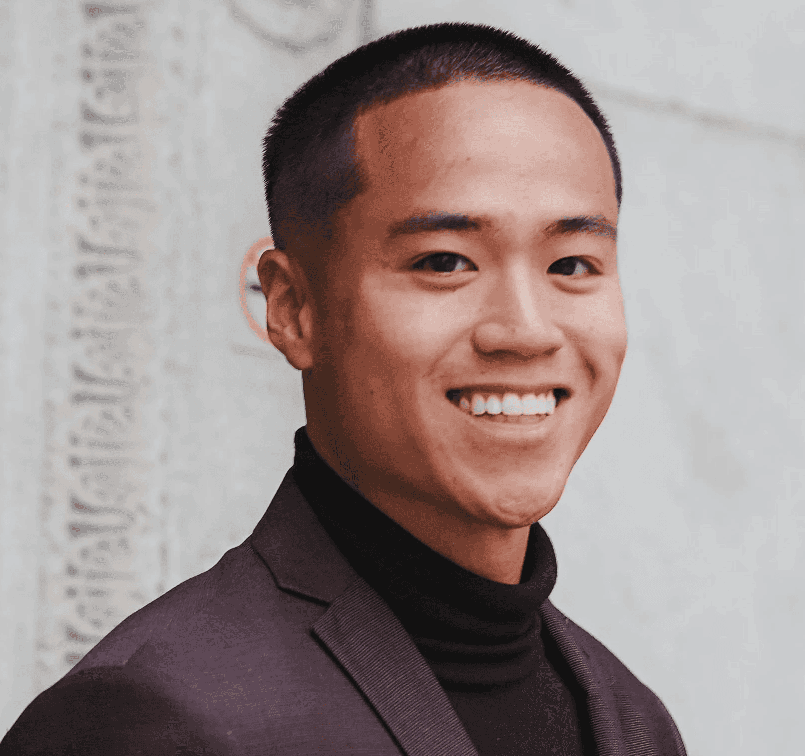 a woman sitting in a chair with a laptop