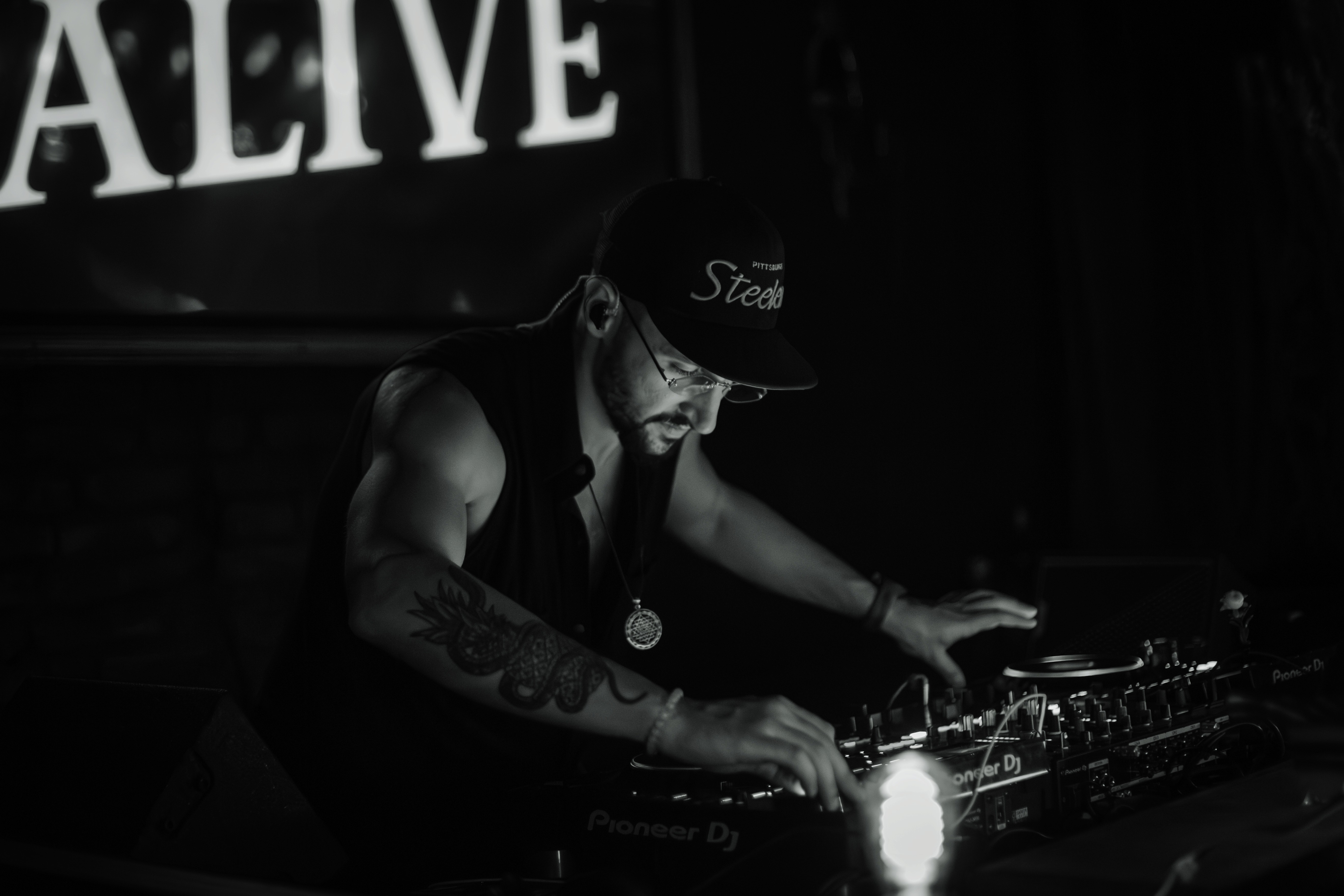 Three mobile phones displaying a banking app