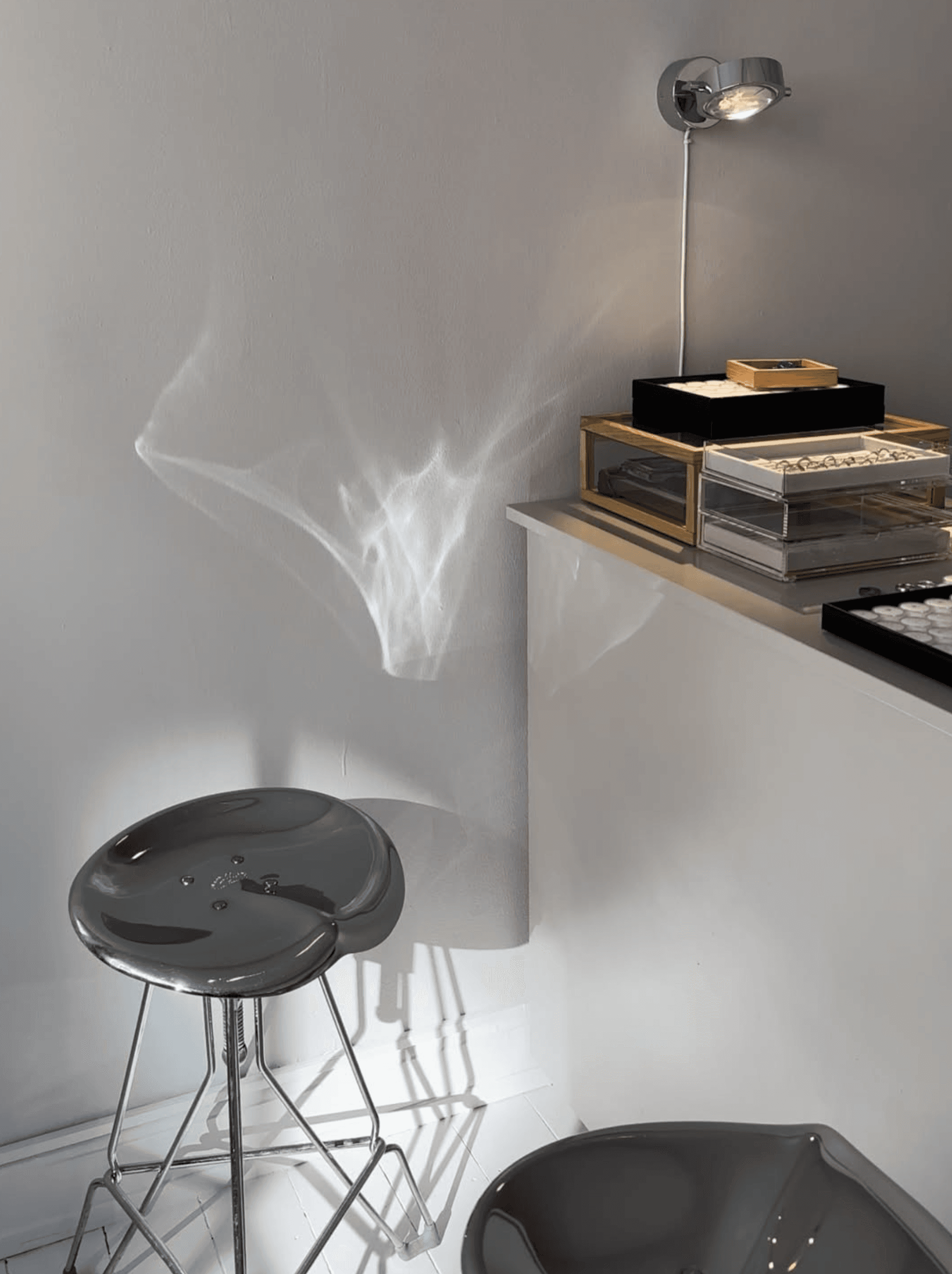 A close-up of a shelf with ceramic vases on it