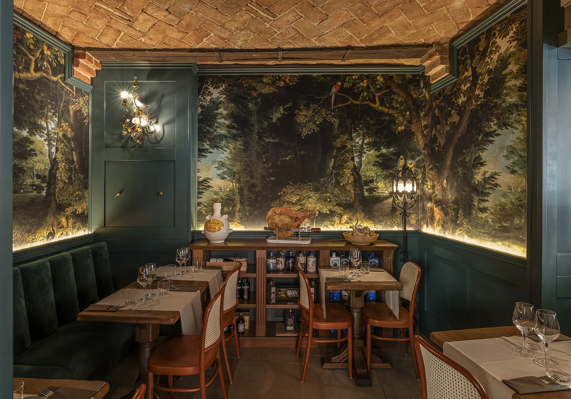 Classic restaurant interior at Enoteca Al Duomo in Modena