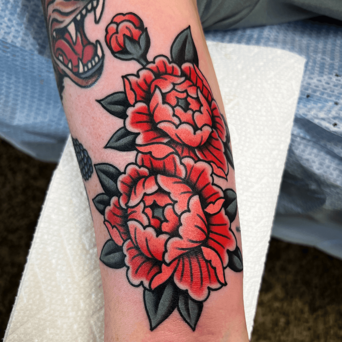 color tattoo of peonies