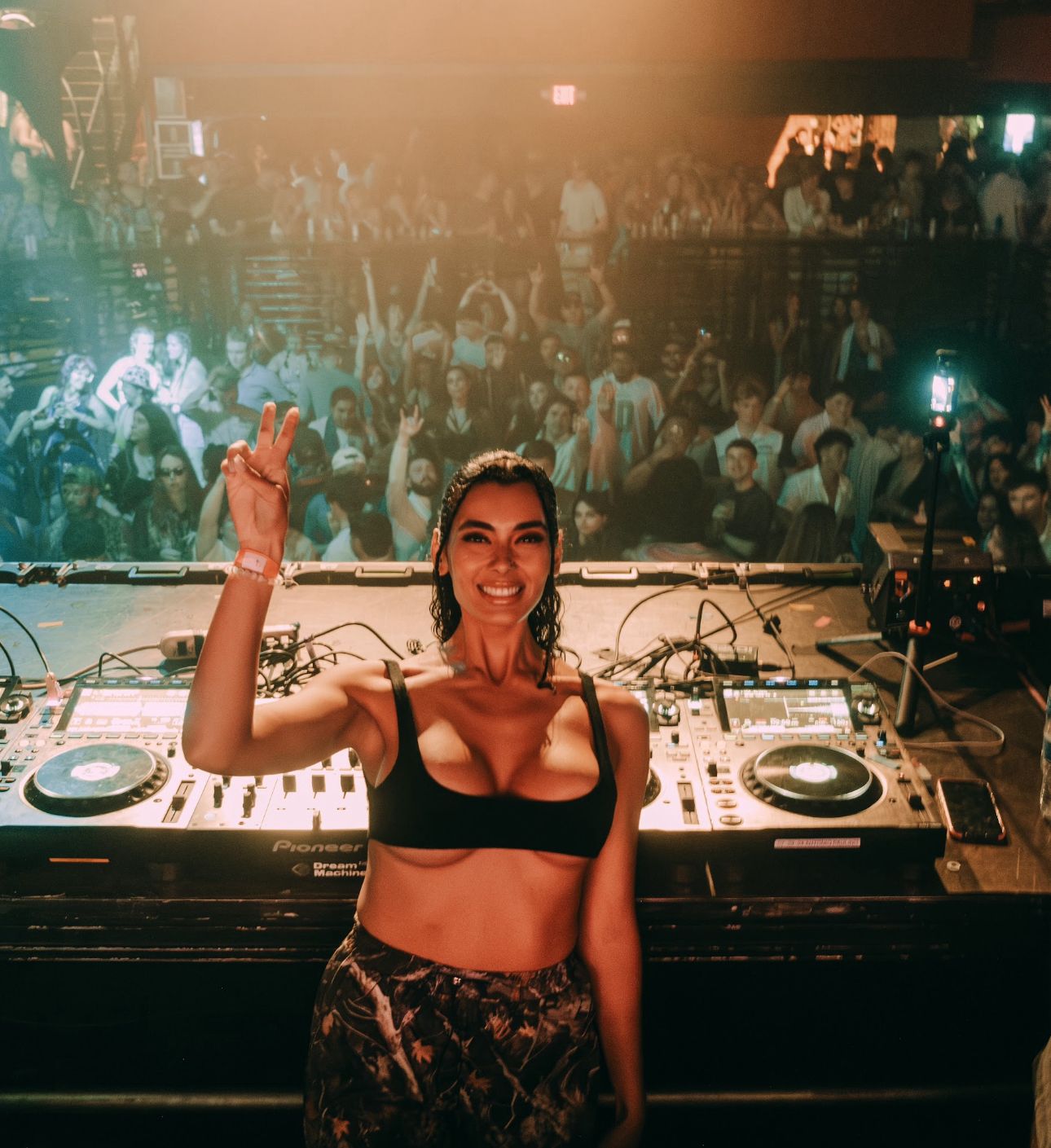 Music producer sitting on a chair in his studio