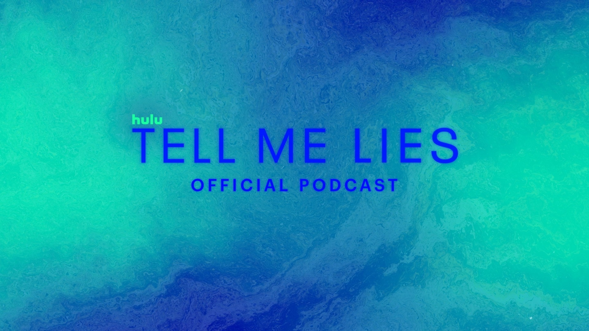 Silver "STUDIO" sign on a brown wooden slatted wall.